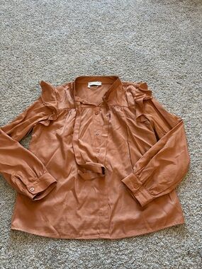 Luna Tuccini Rust-Orange Ruffled Blouse